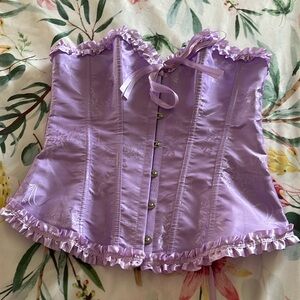 Lavender color, flower detailed, Medium sized bustier corset; worn once.